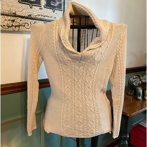 Beautiful oatmeal colored cable knit sweater in size L. Runs a bit small. EUC